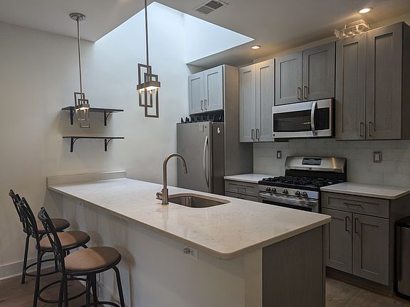 Open kitchen with plenty of storage and counter space