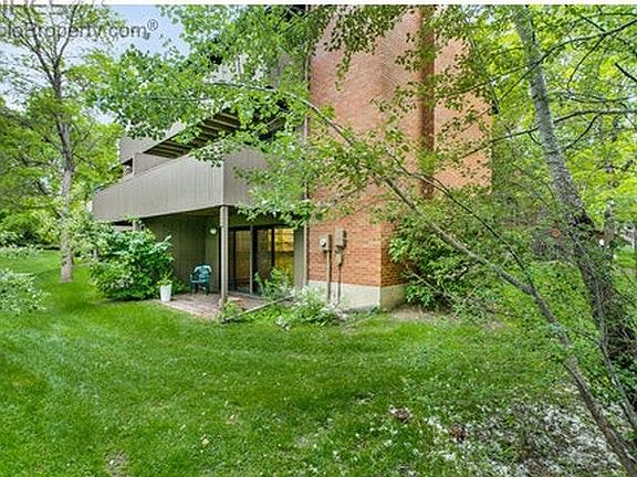 Back of Townhome, garden level patio and 2 decks (living room and master bedroom)