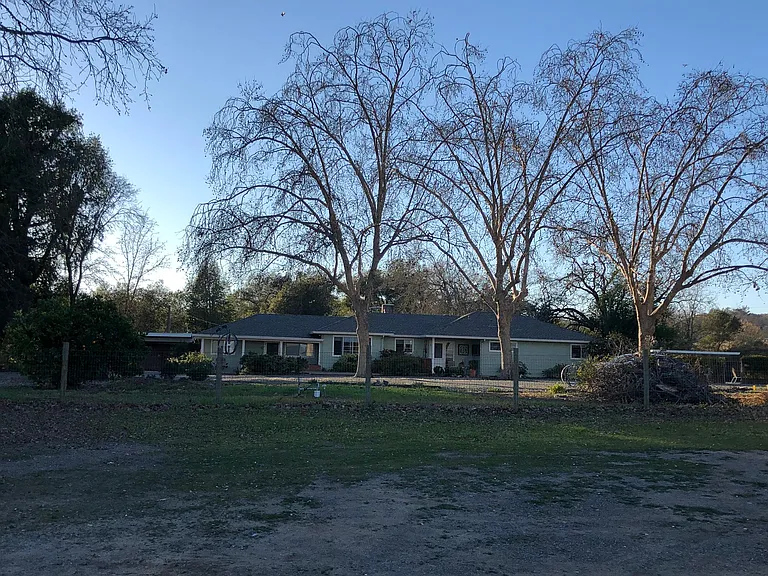 House on three acres, with two units.