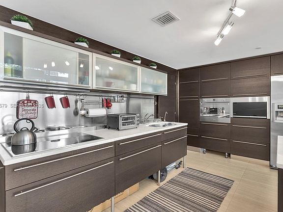 5th image of 6000 Collins Ave APT 129