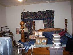 Bedroom 2. Owner clearing out.