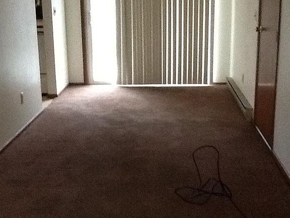 Living room has coat closet