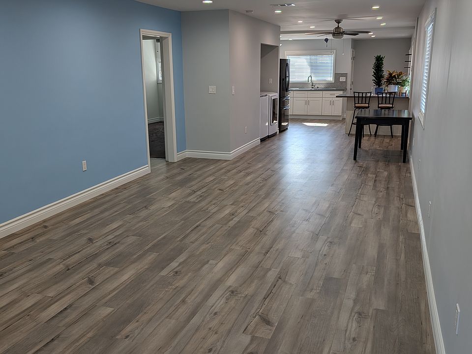 Kitchen, dining area, and living room