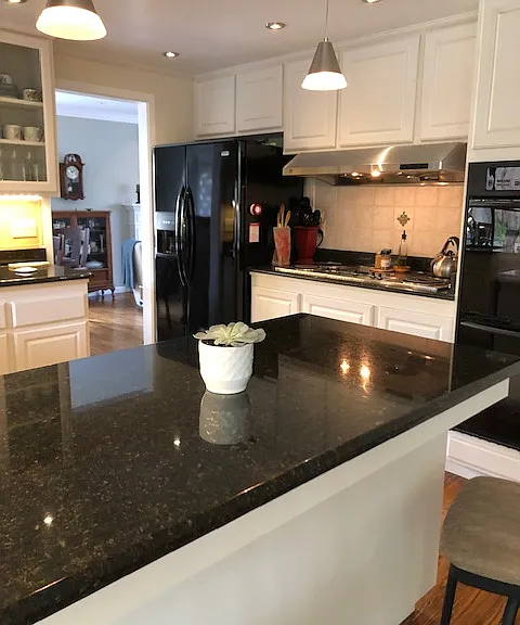 Well appointed Kitchen with shared Refrigerator access