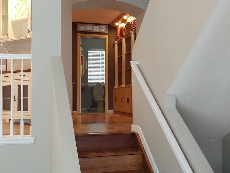 Stairs up from the livingroom.