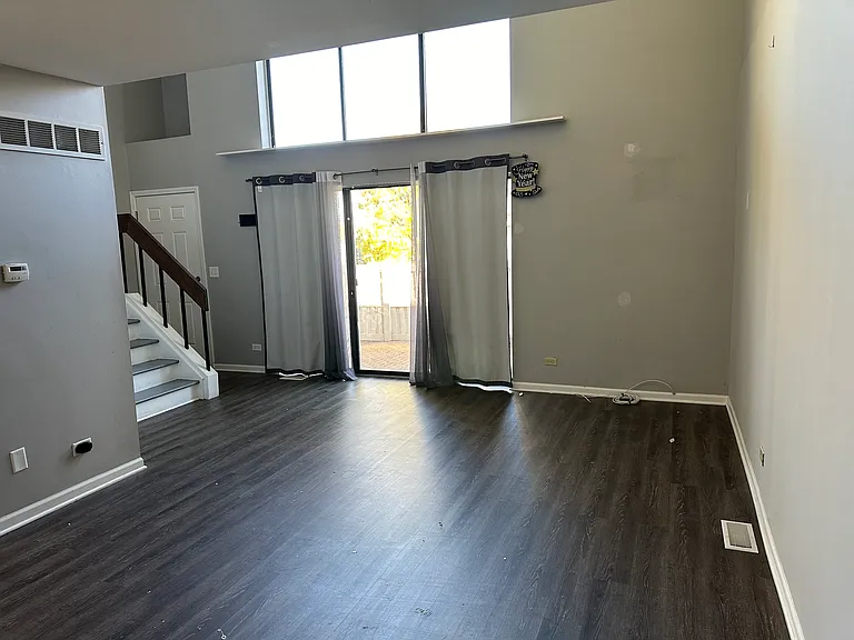 Living room and access to private patio