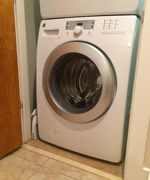 Washing machine in separate enclosed space