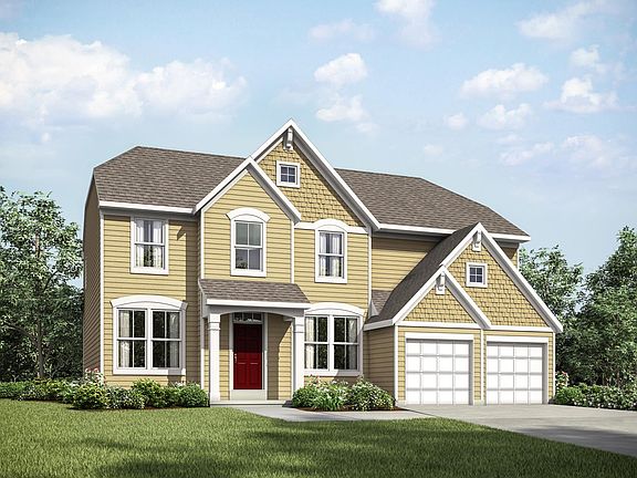 custom home with siding and shakes