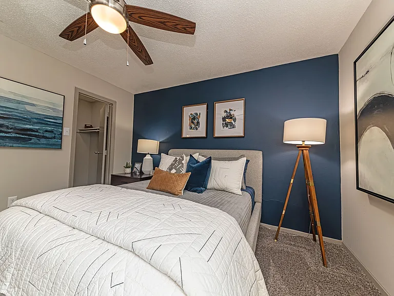 Bedroom with carpet and overhead lighting