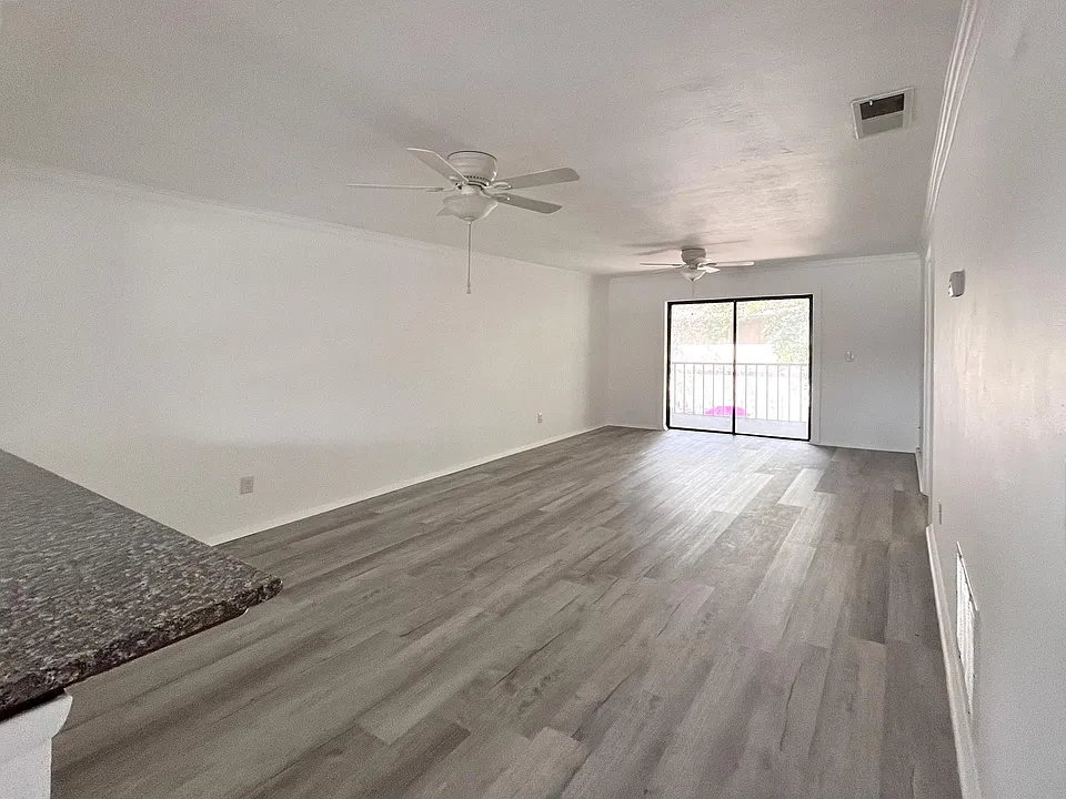 Open floorplan living space to live/dine/work. Brand new laminate wood flooring.