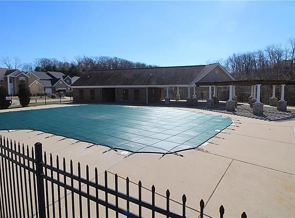 Subdivision pool is just around the corner from the house!
