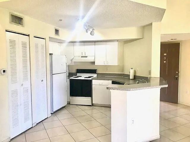 741 N Pine Island Rd #303 — Photo 11