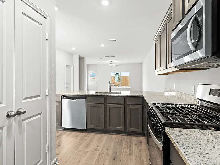 The kitchen has energy-efficient appliances.