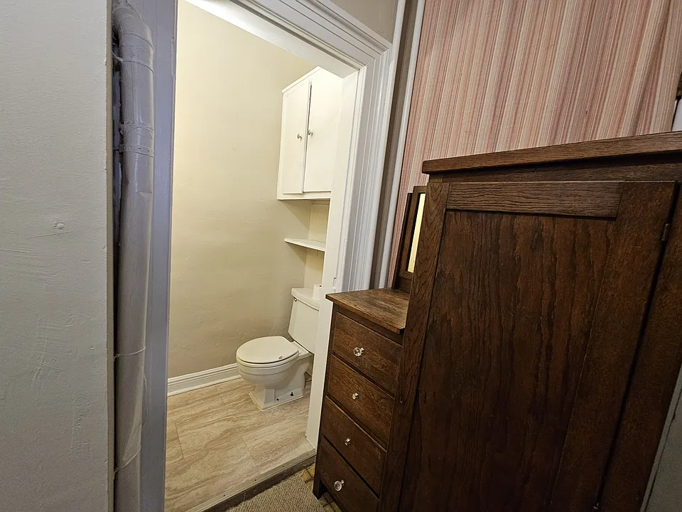 Bathroom w/New Flooring and Shower off of Bedroom.