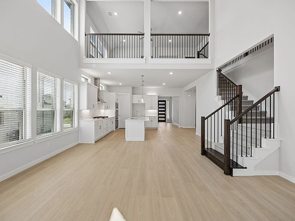 Kitchen in the Monet II home plan by Trophy Signature Homes - REPRESENTATIVE PHOTO