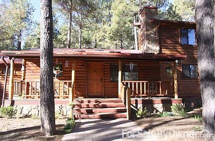 Front of Home
						:
						Log Home with Metal Roof