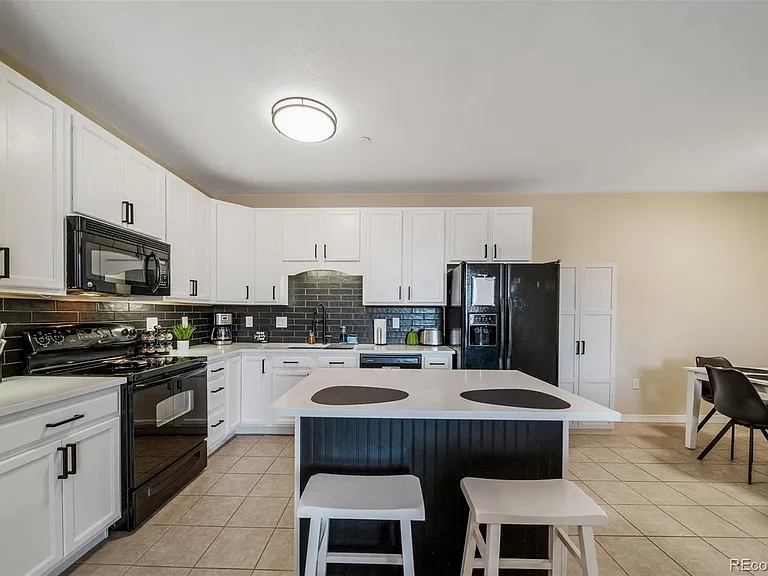 7292 S Blackhawk St #203 — Photo 11