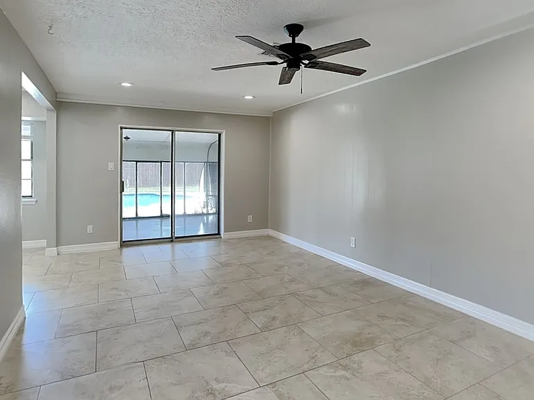 Spacious living room with neut