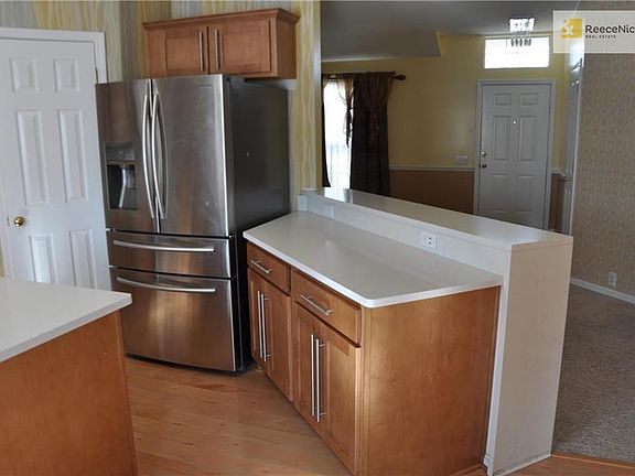 View from back door looking into Kitchen and Main Level Family Room