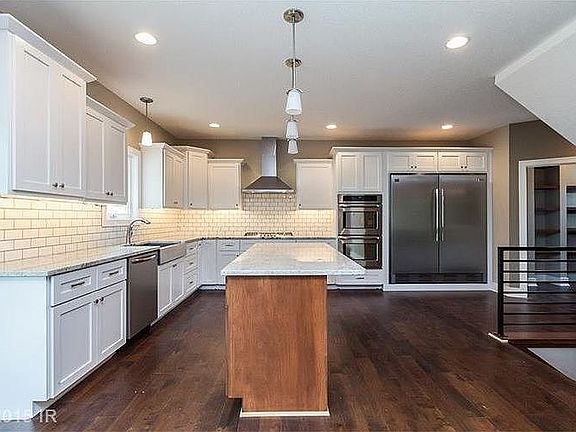 Kitchen with built in fridge