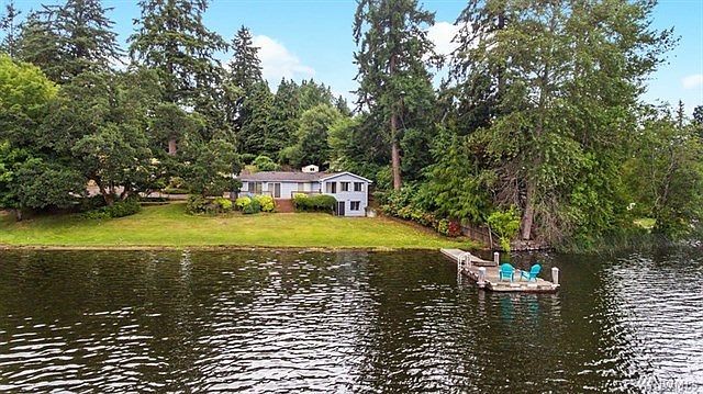 Long Lake Rambler With Walk-Out Basement...120' of low bank water frontage with bulkhead and private dock.