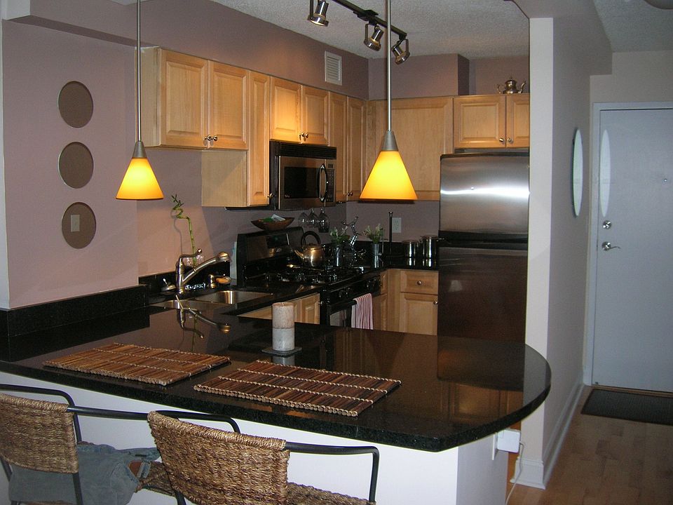 granite countertops, hardwoods, stainless steel appliances