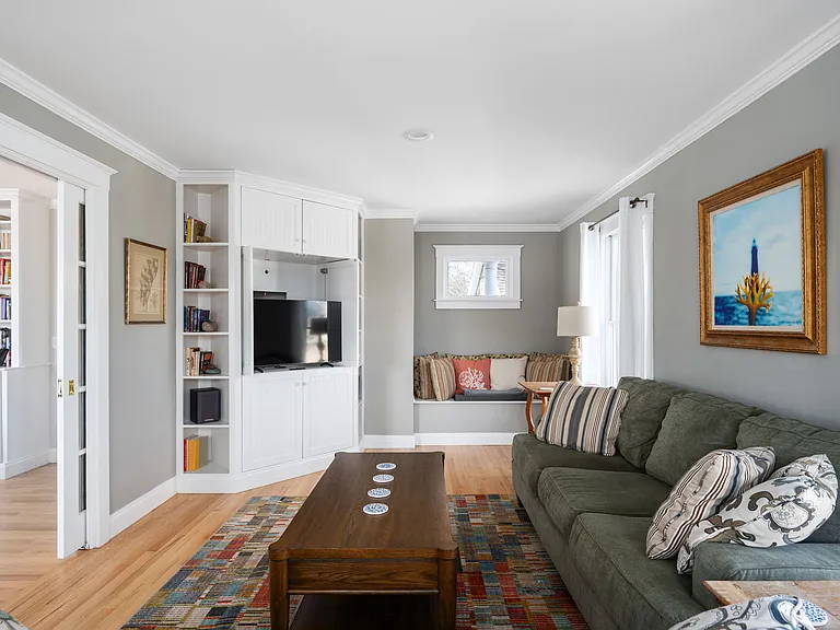 Den/TV room with French pocket doors that can close for added privacy.