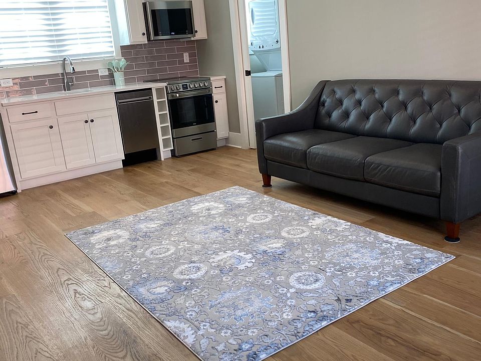 Living space and kitchen with all new appliances