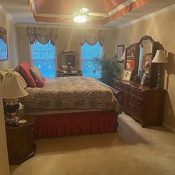 Upper sleeping level Master BR featuring ceiling Fan and Tray ceiling