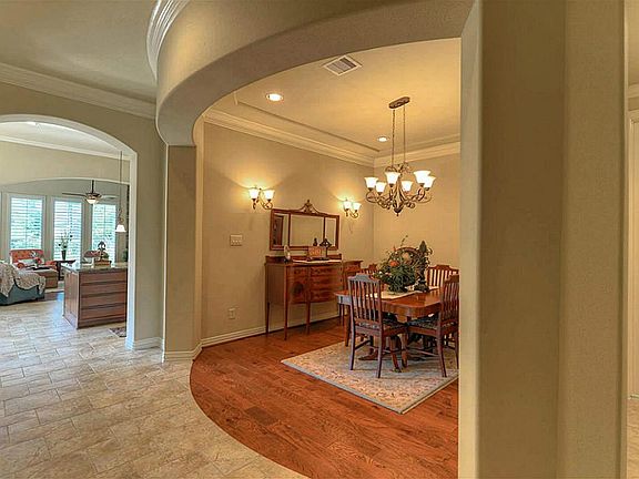 Beautiful custom features throughout including 8-foot doors & customized closet for holiday decor & 