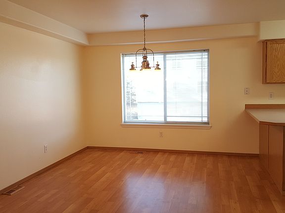Dining Area with large breakfast bar and easy to clean lamin