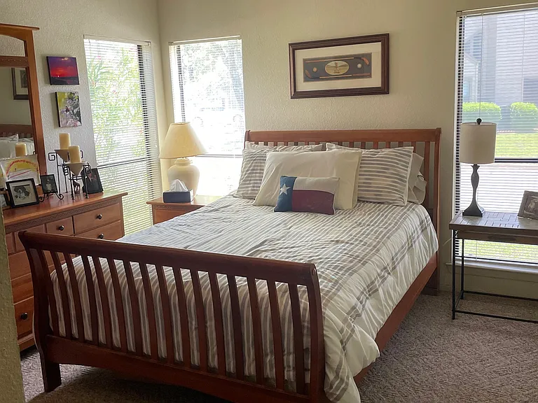Second bedroom is comfortable with a large closet.