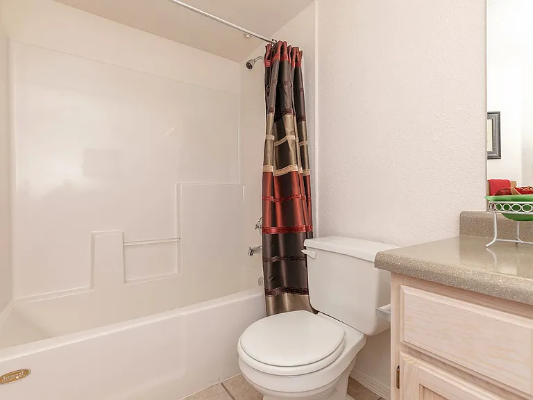 Spacious Bathroom with Tub and Shower