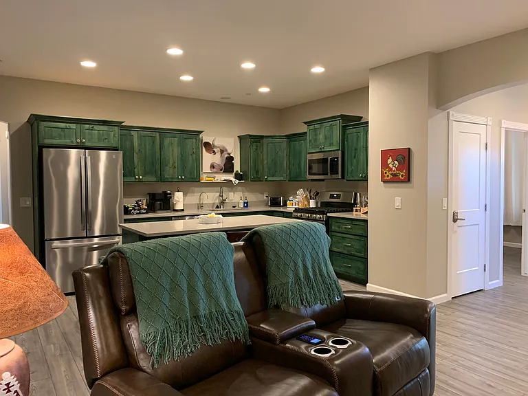 Another view of the kitchen and living room.