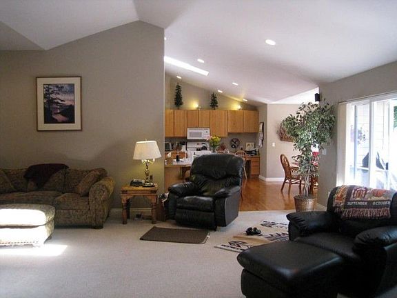 This Living area is open to the kitchen, dining & most other areas of the home.