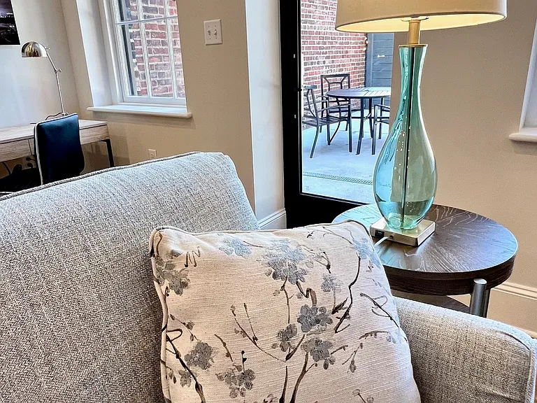 Custom couch and view onto the patio.