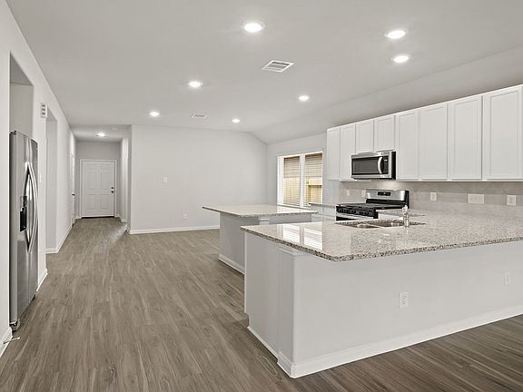 Family Room to Kitchen and Dining Area