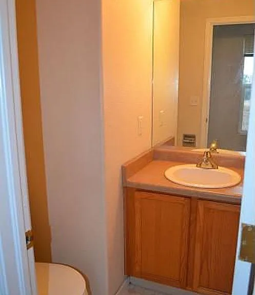 First floor half-bath with new LVP flooring.