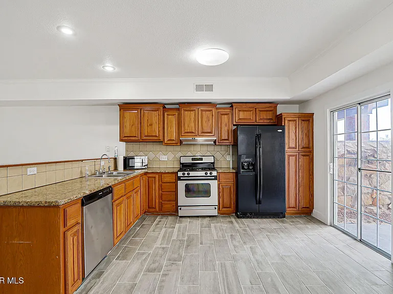 7235 Royal Arms Dr #E — Photo 13