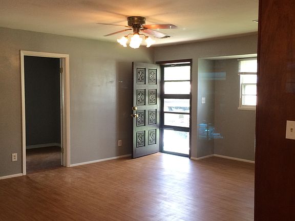 Living room looking out front door.