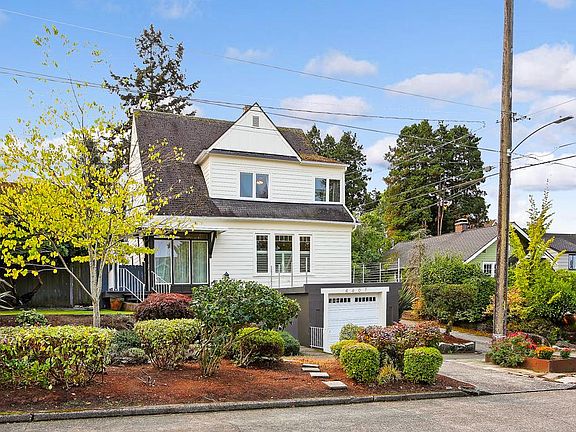 Wonderful family home with mature landscaping on quiet street with 1-car garage, driveway and ample street parking