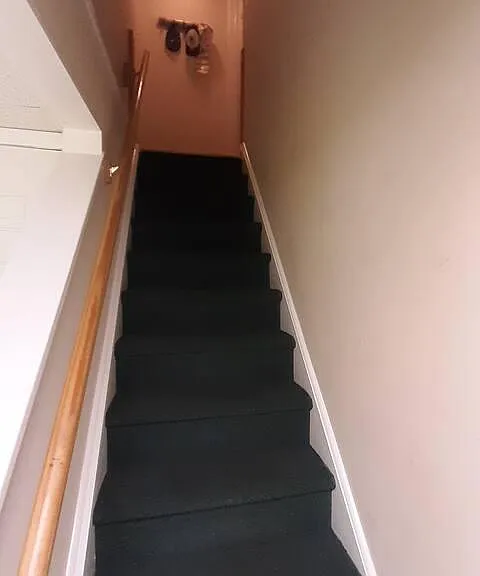 staircase from the basement to the ground floor