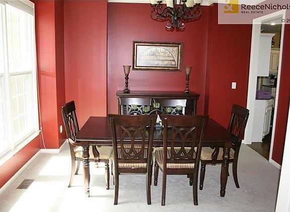 The formal dining room is waiting for all your guests.