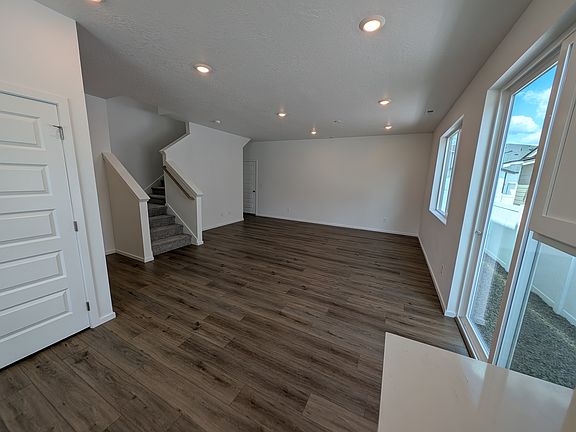 Main living area with access to fenced in sideyard.