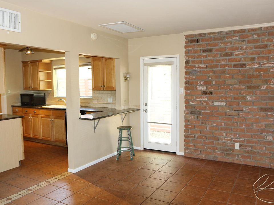Living looking into kitchen and back door