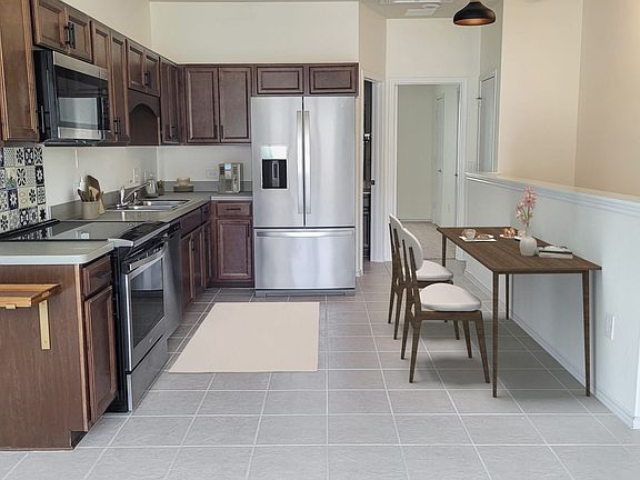 Virtually staged; kitchen