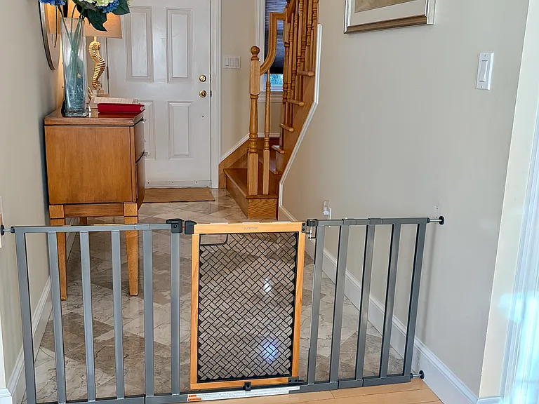 Option for a safety gate to keep little ones and pets away from staircase.