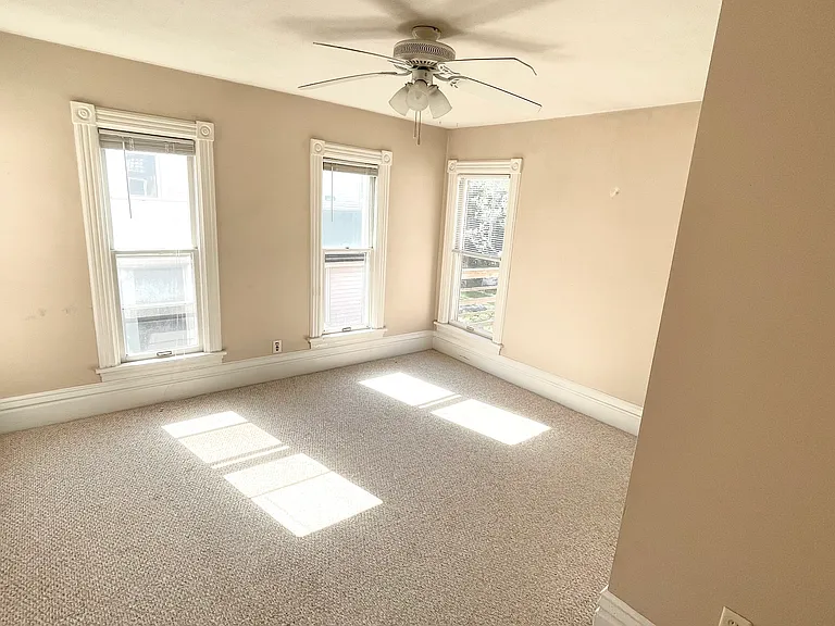 Large bedroom, large windows facing South, very sunny.