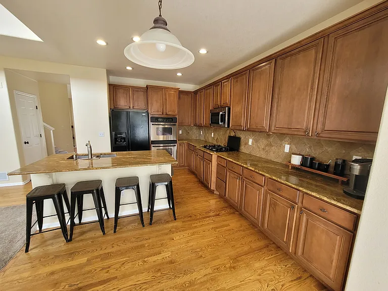 Eat in kitchen with space for both a table and island seating