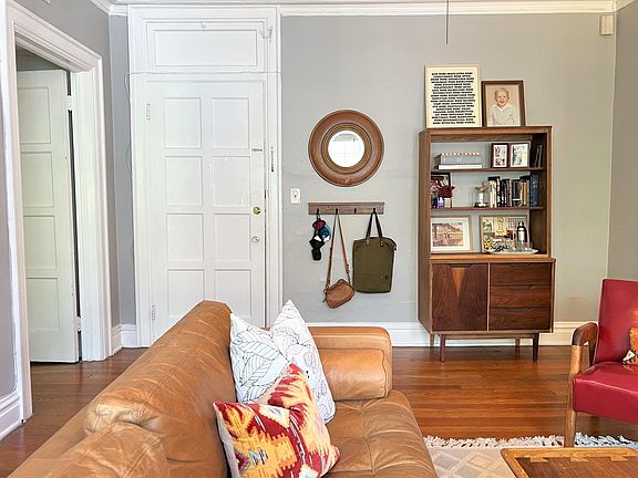 Apartment front door and doorway to hall